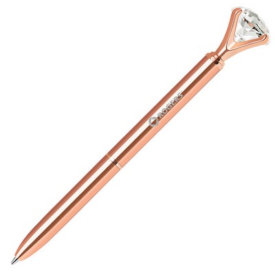 Brass twist action ballpoint pen with embedded diamond crystal on top.