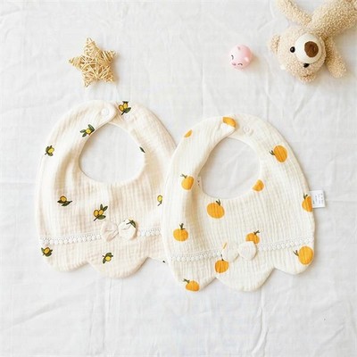 "Secure and Stylish Cotton Baby Bib with Convenient Buckle"