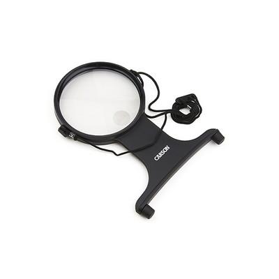 MagniFree™ a Hands Free, hanging 2x Magnifier with a 3.5x power bi-focal spot lens.